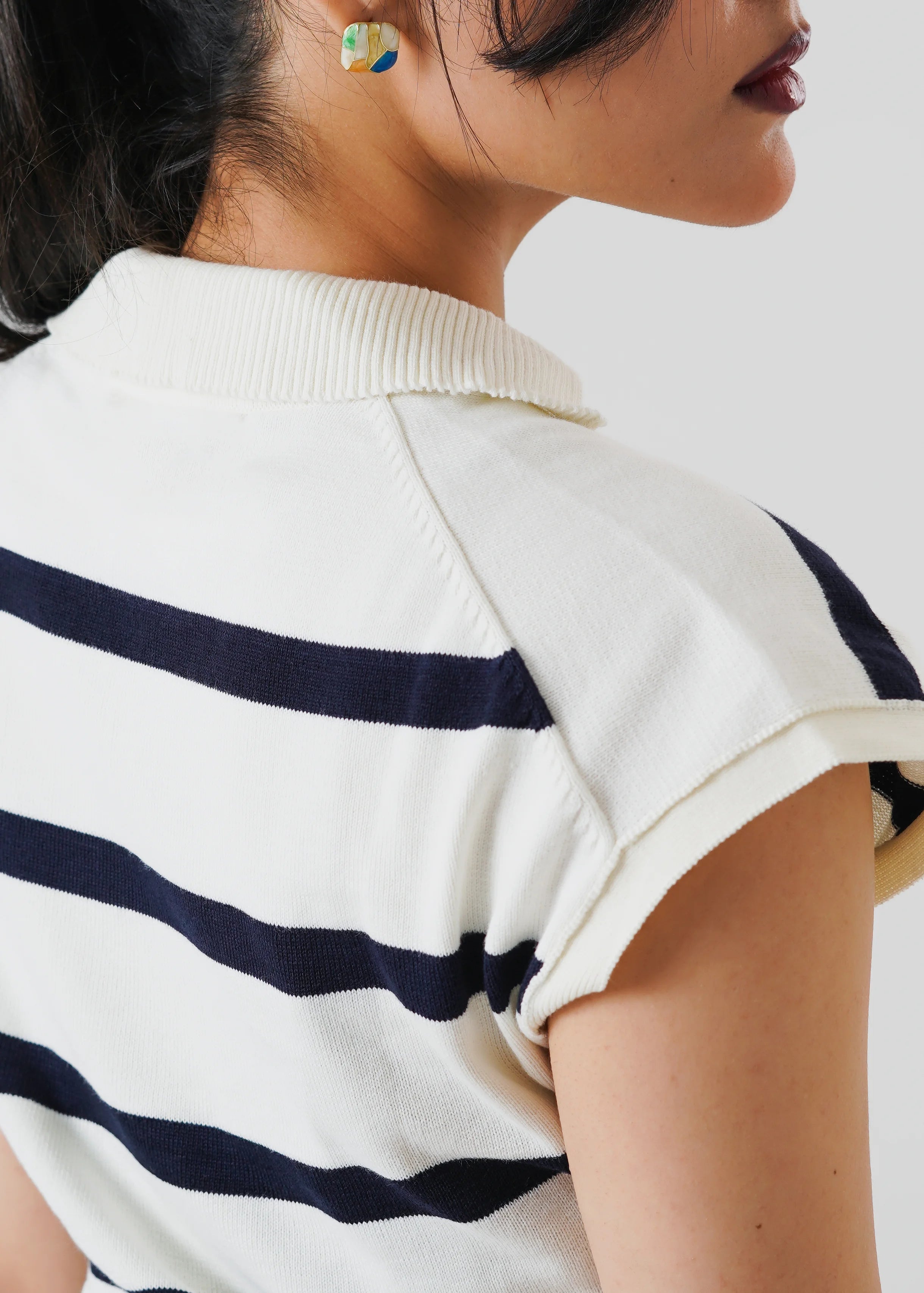 STRIPPED SLEEVELESS CROPPED KNIT POLO