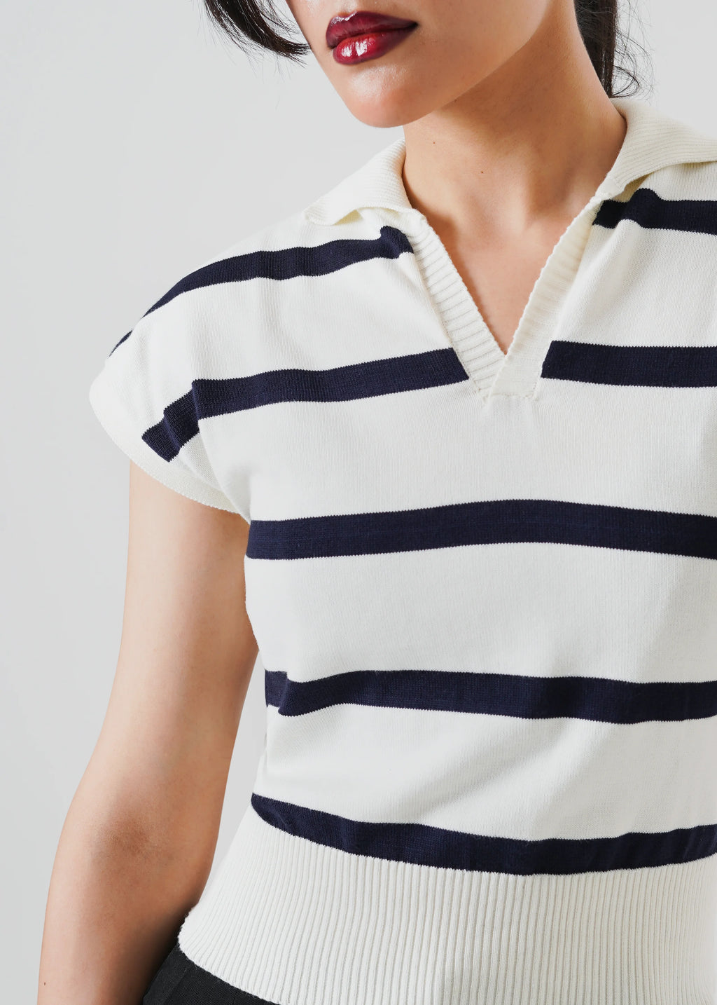 STRIPPED SLEEVELESS CROPPED KNIT POLO